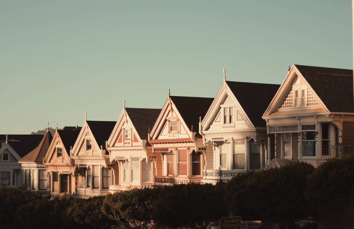 sun setting on townhouses