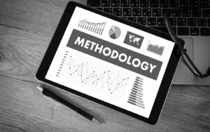 Tablet screen showing charts and graphs with the word “Methodology”