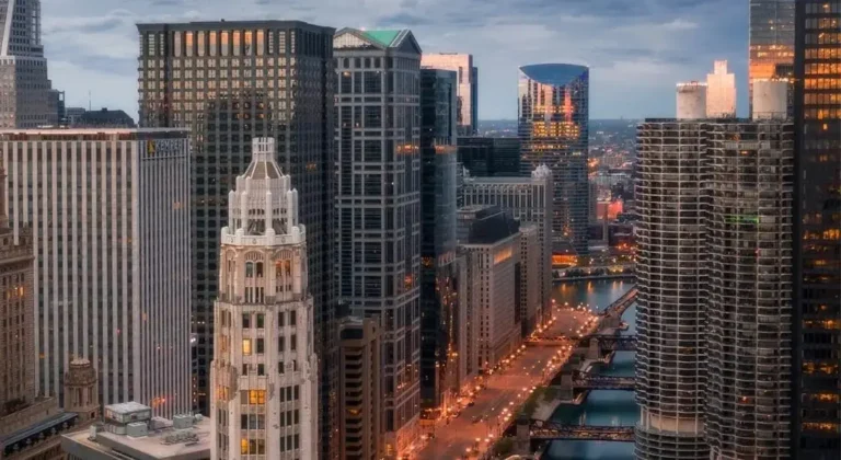 A view of downtown Chicago at dusk, representing the region at the center of Zillow’s dispute with MRED over private listing network rules.