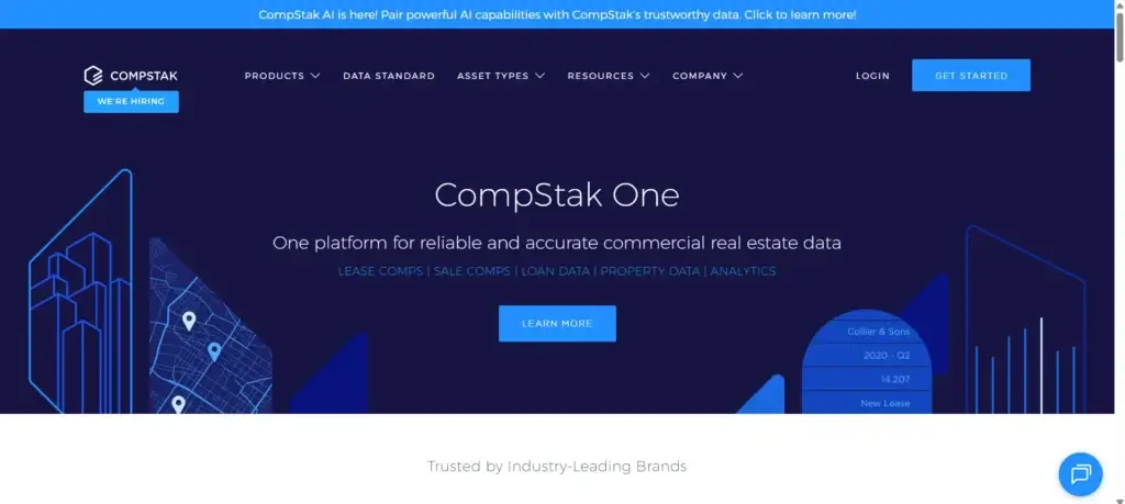 The homepage of the CompStak website showing a dark blue background with digital illustrations of city buildings and property data categories.