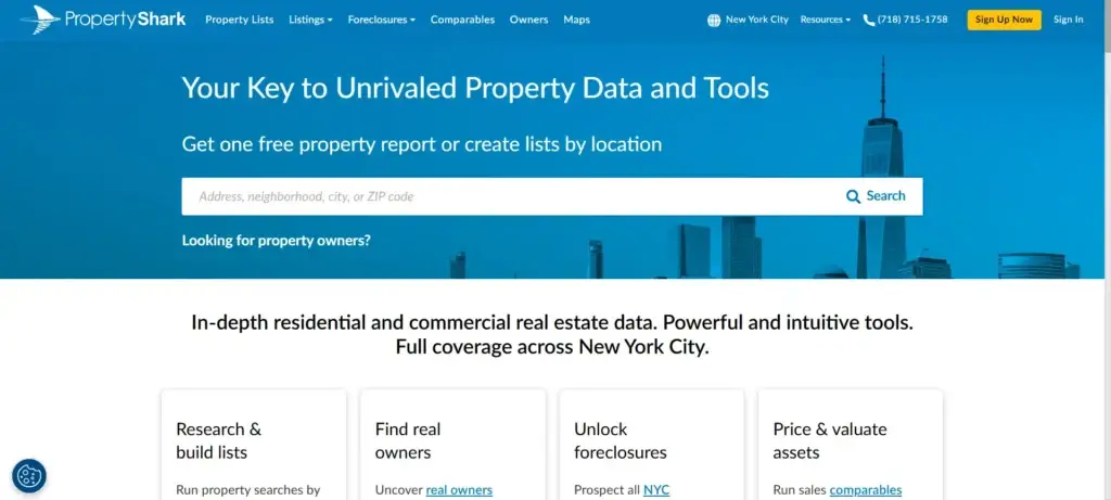 A screenshot of the PropertyShark website homepage displaying a search bar for property reports and sections for research and foreclosures.